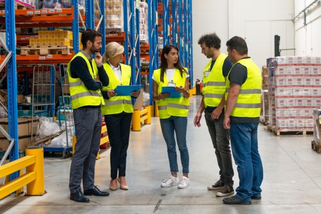 Workers in Warehouse | CLS Blog